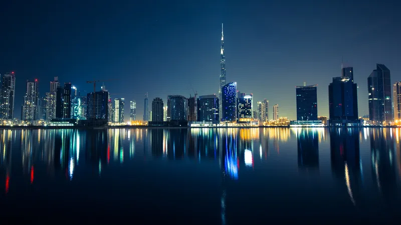 Dubai skyline at night showing Burj Khalifa and Downtown Dubai property market